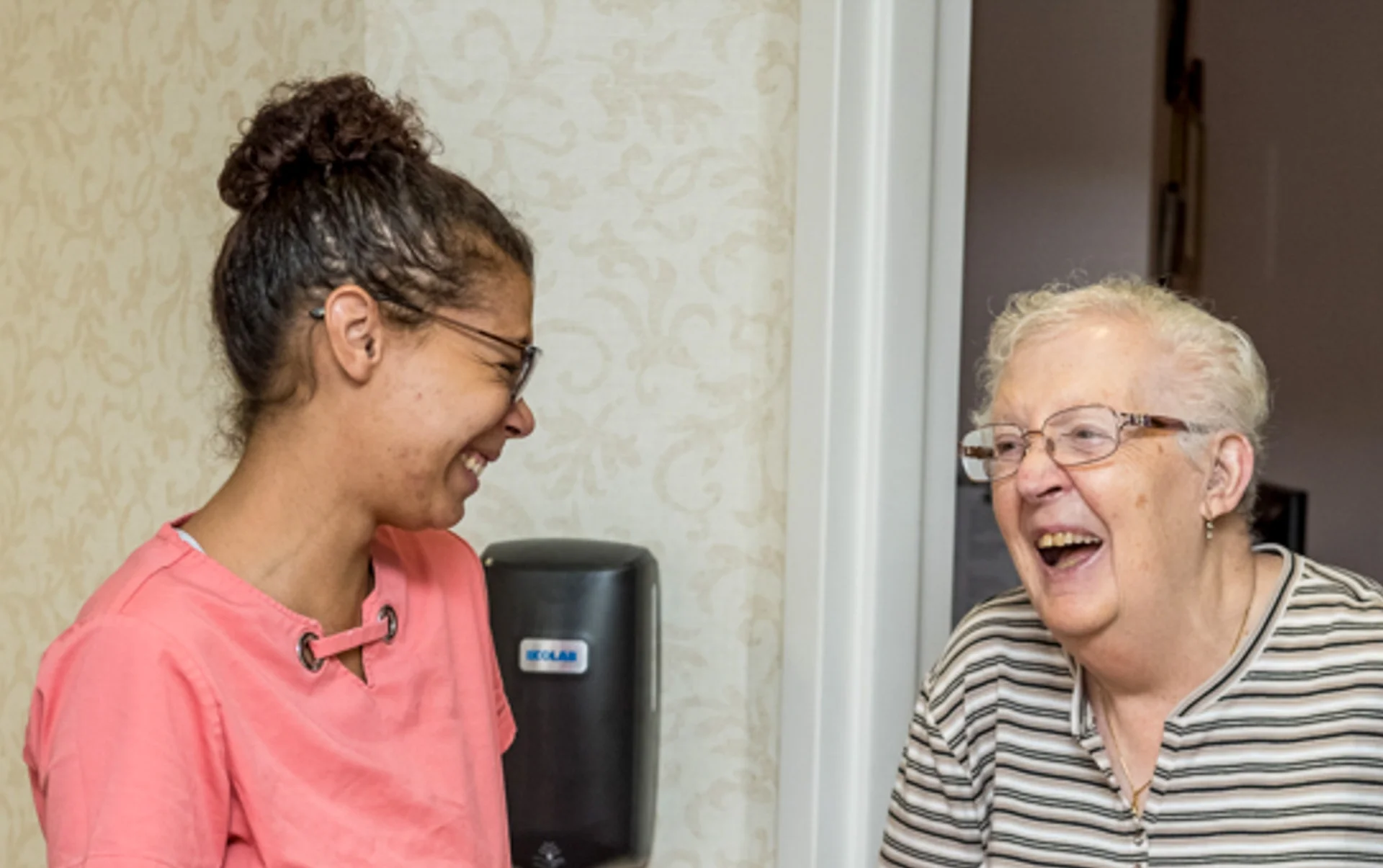 resident and aid laughing