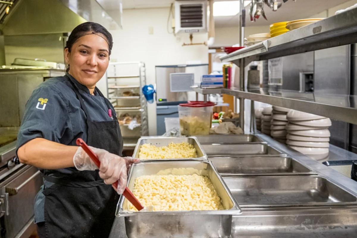 woman preparing mac and cheese